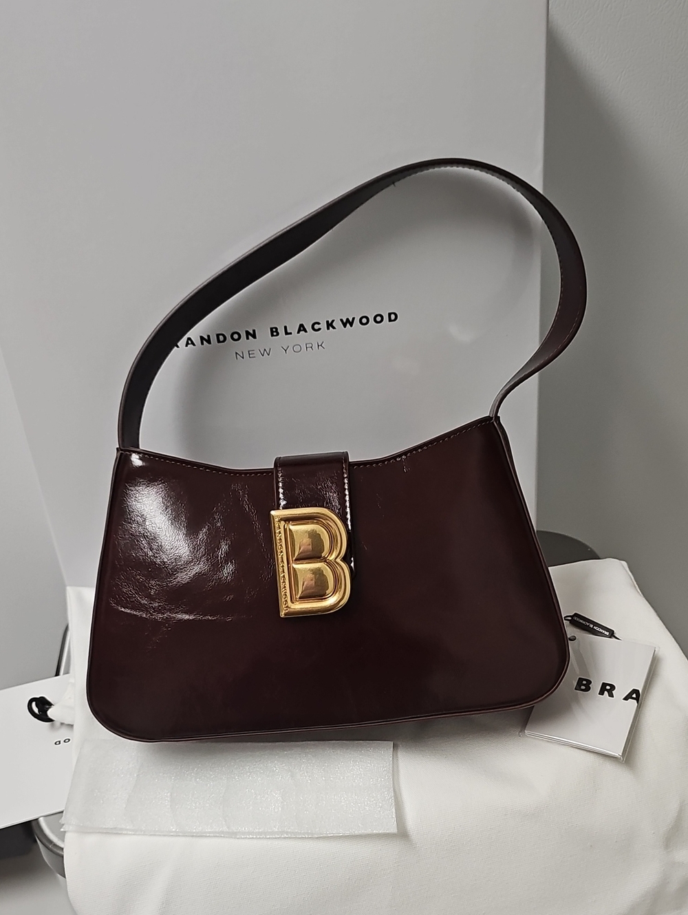 Brandon Blackwood Wine-Red Patent Leather B-Buckle Shoulder Bag